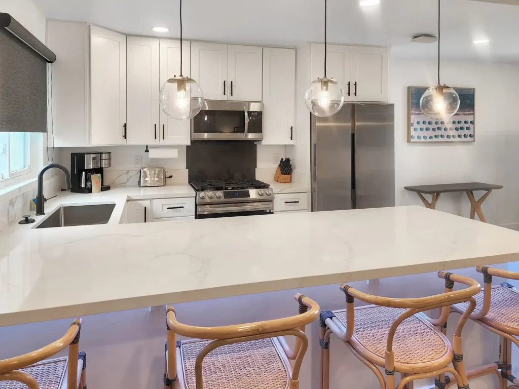 Charming one-bedroom apartment with King bed, living area, and full kitchen.