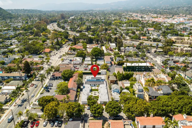 Aerial map view with a red pin marking a residential property.