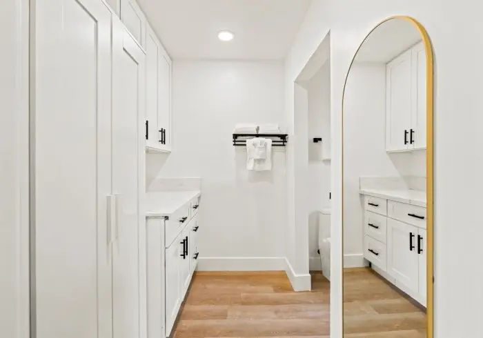 Hallway and vanity area in Deluxe Queen suite.