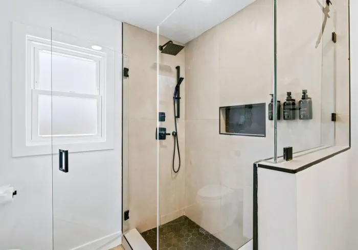 Walk-in glass shower inside the Penthouse bathroom.
