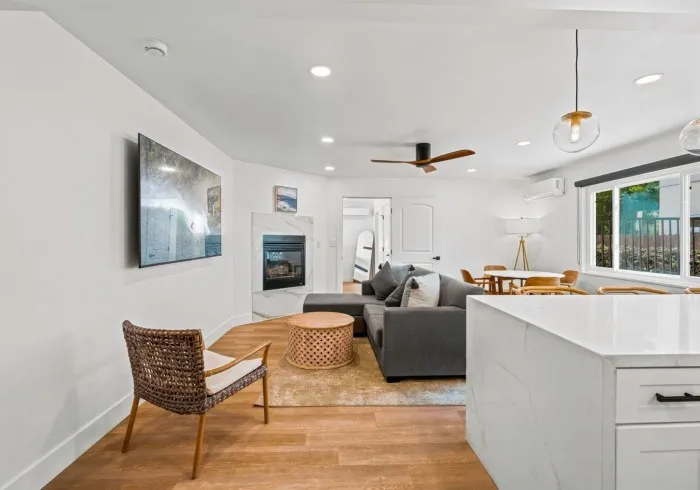 Spacious Penthouse interior showing living, dining, and kitchen areas.
